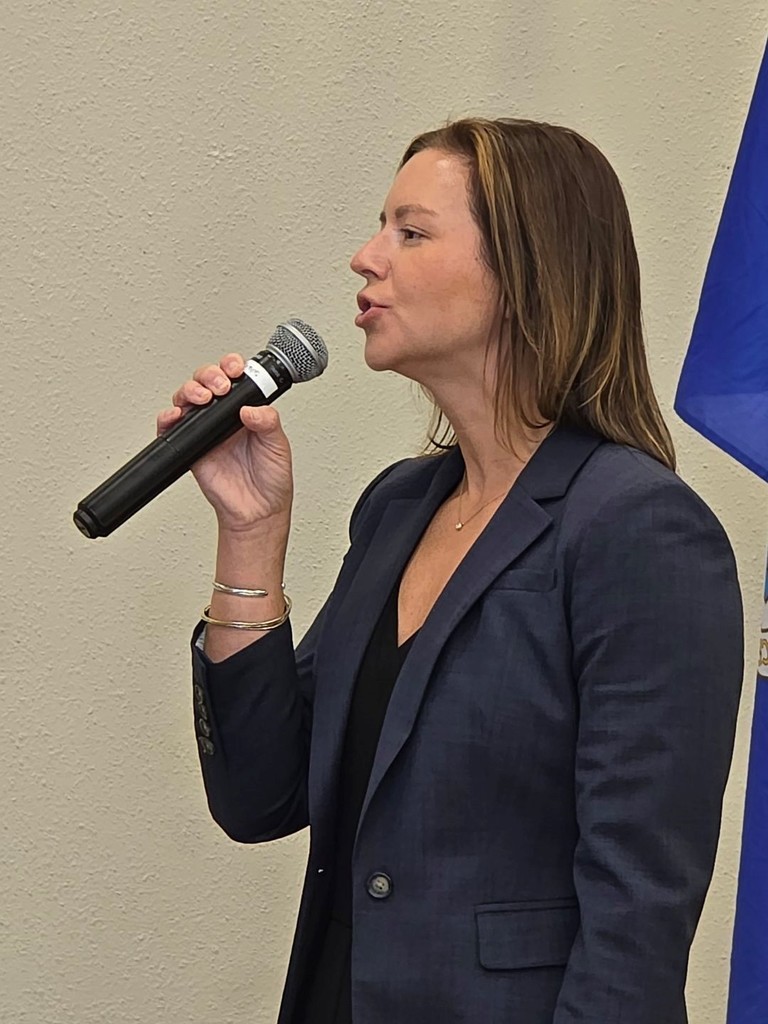 Ms. Jessica Hunt performing the National Anthem