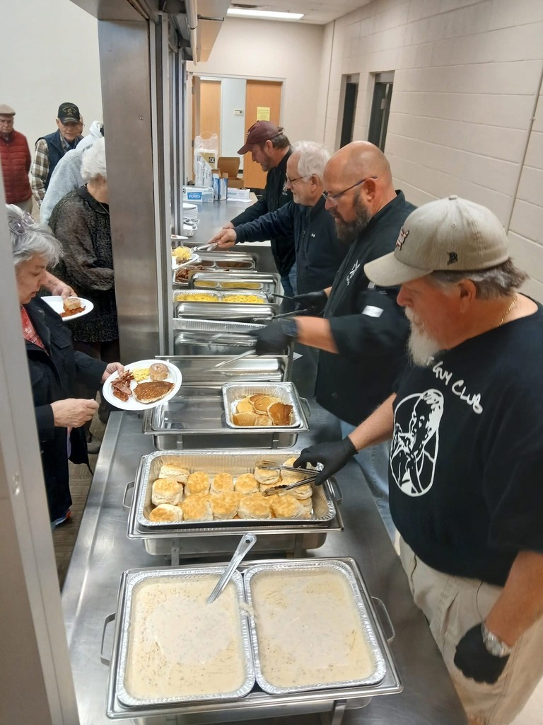 The Fat Guys Club serving Breakfast on Veterans Day