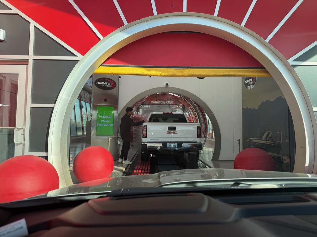 A truck going through a Car Wash