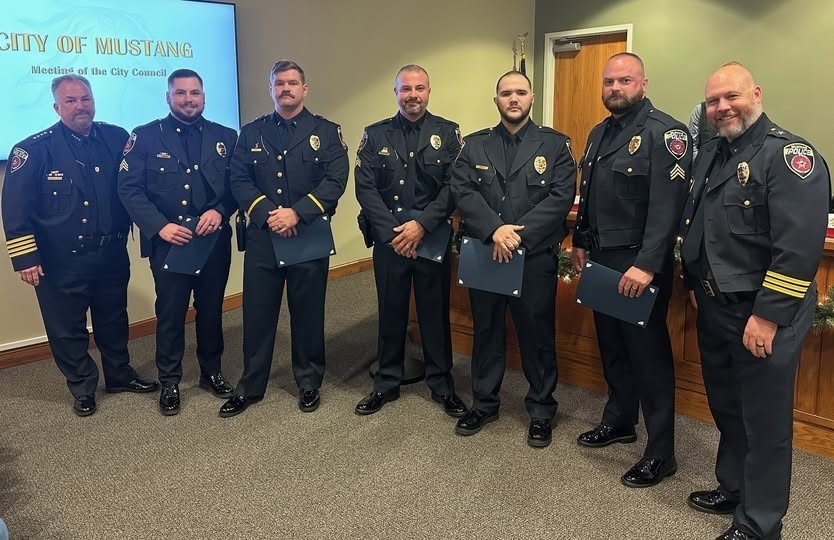 A photo of Police Officers Receiving an award