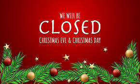 A sign that reads "We Will Be CLOSED Christmas Eve & Christmas Day