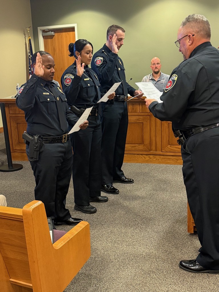 Photo of Officers Being Sworn in at City Council meeting