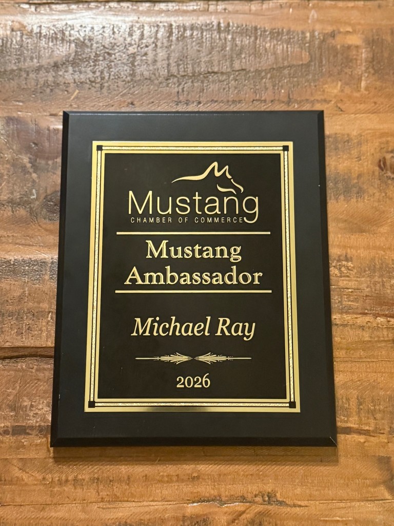 A plaque naming Michael Ray Mustang Ambassador of 2026