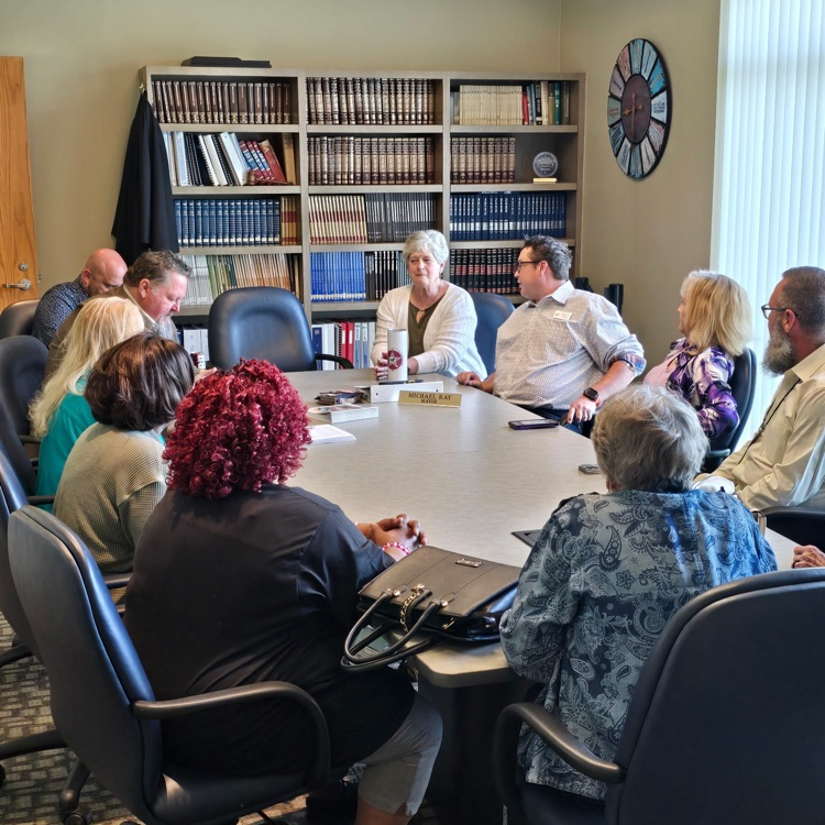 people gathered in council chambers for coffee with mayor meeting