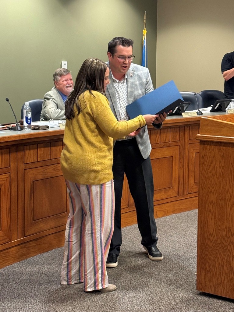 Mayor Ray presenting a proclamation to Councilwoman Balliew