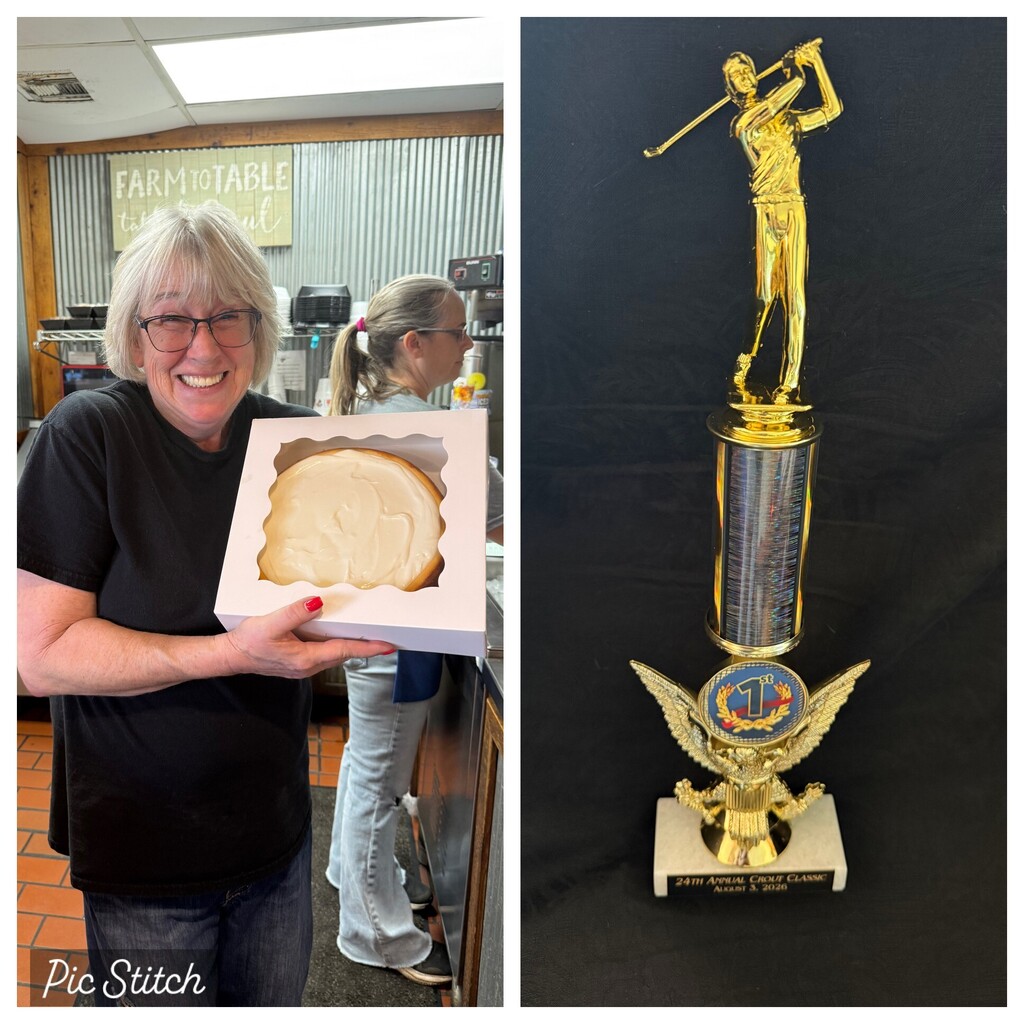 Cindy from Del Rancho holding a cheesecake and the winning trophy