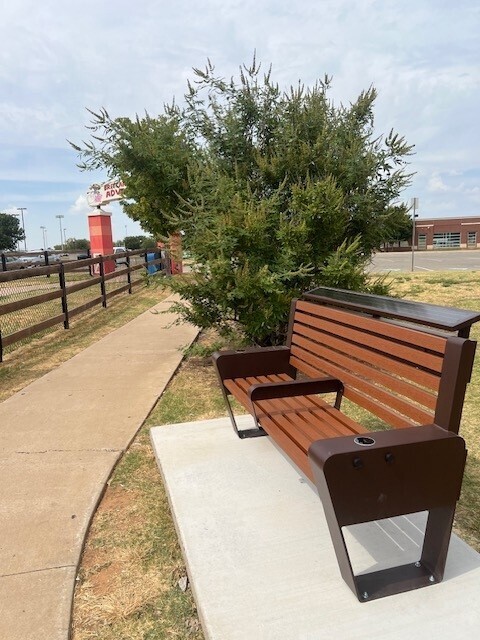 A photo of a bench near Brittany's Play Adventure playground