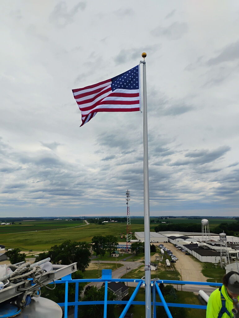 American Flag on top of the City of Plainview Water Tower