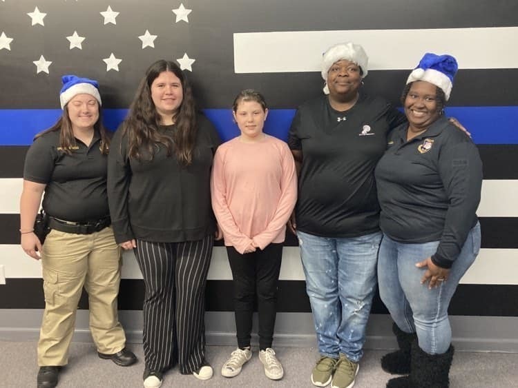 Alicia helping with Blue Santa