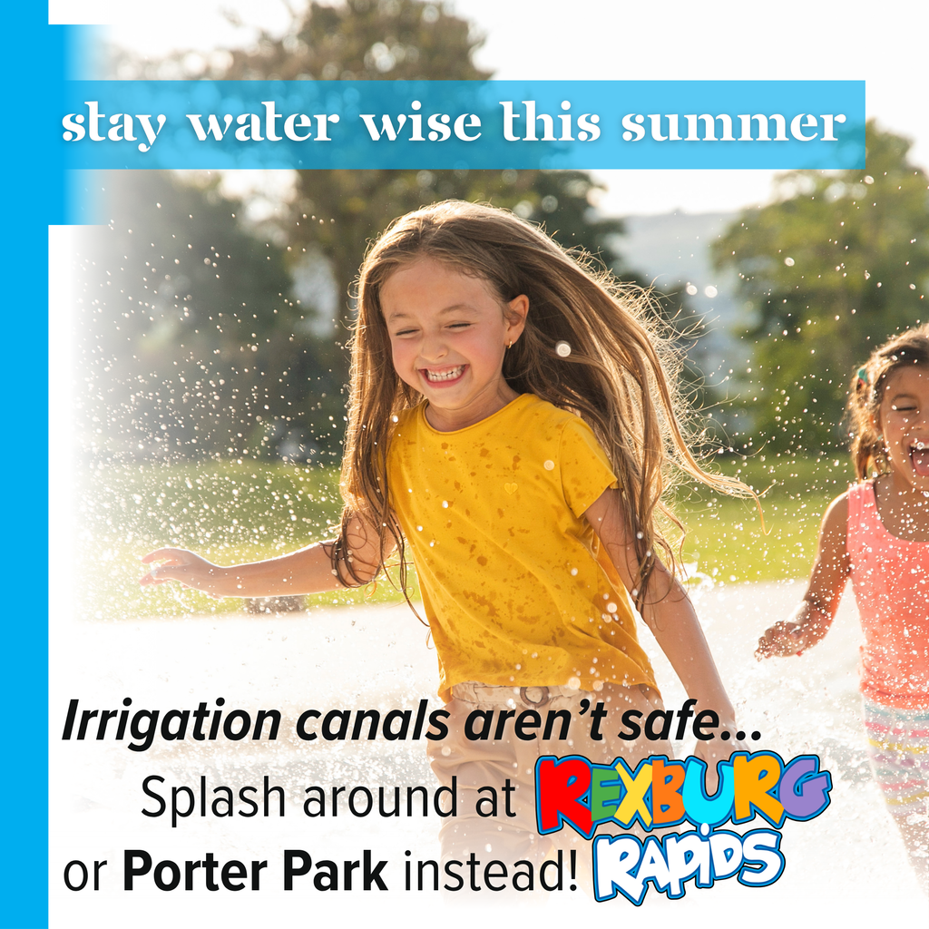 two girls dressed in bright summery clothes splashing in water in  a park text "stay water wise this summer | irrigation canals aren't safe...splash around at [Rexburg Rapids] (logo used as text) or Porter Park instead!"
