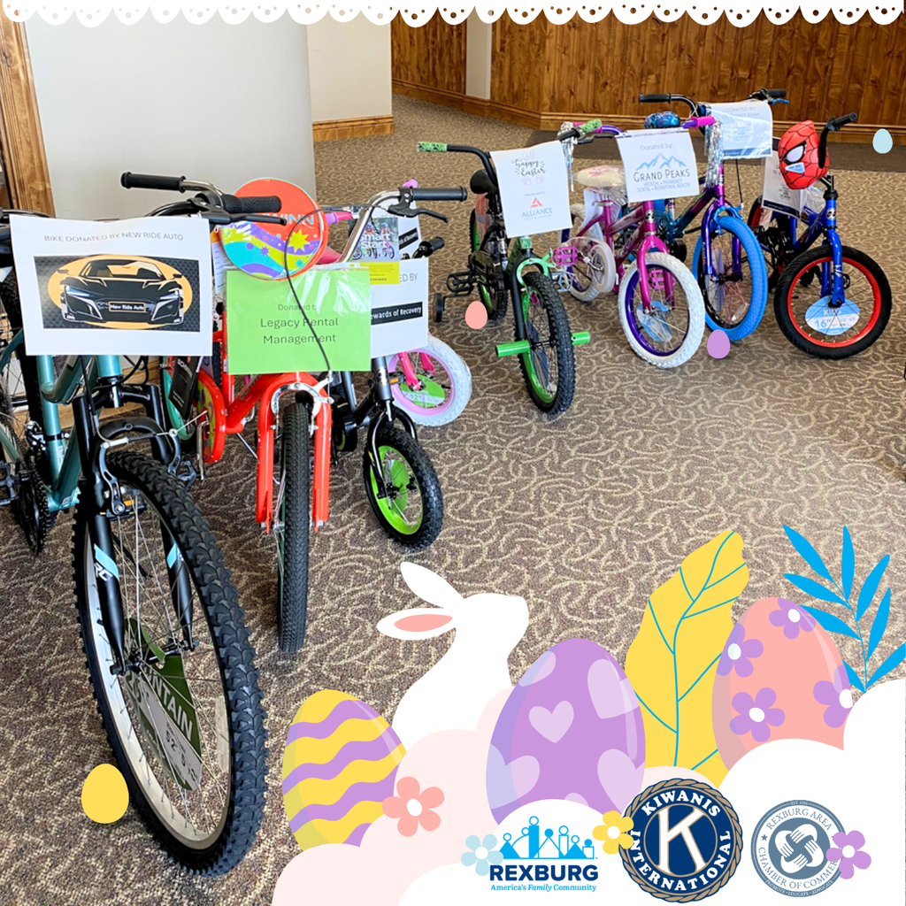 photo of a line of kids bikes in front of  City Hall and some Easter graphics