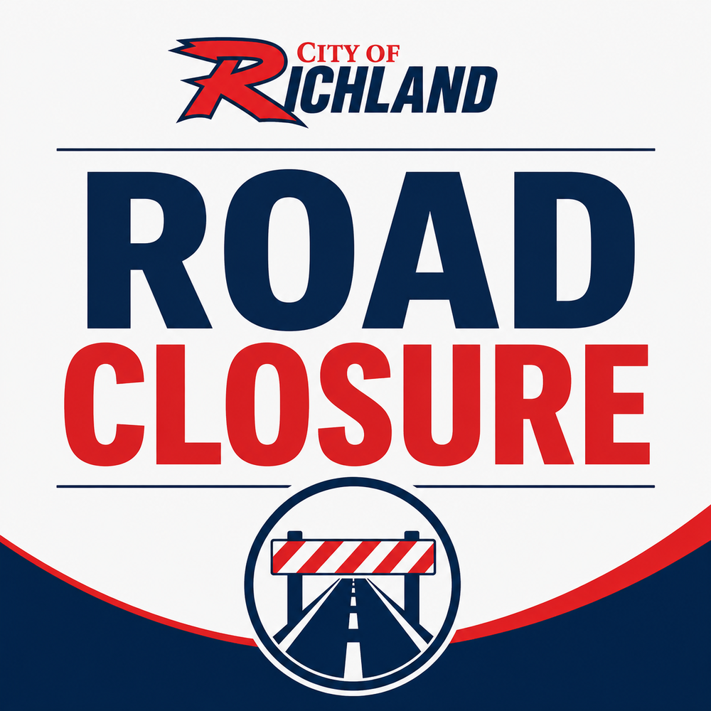 A white City of Richland road closure graphic featuring the City of Richland logo at the top, large bold text reading "ROAD CLOSURE" in navy and red, and a circular icon of a road blocked by a striped barricade near the bottom. The graphic serves as a general traffic alert and does not include specific closure details, dates, or locations.