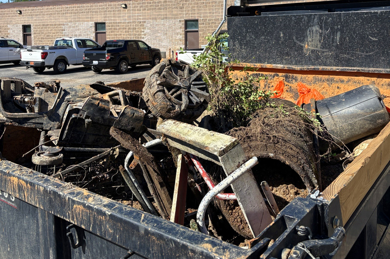 Truck load of trash and debris collected from creek cleanup event