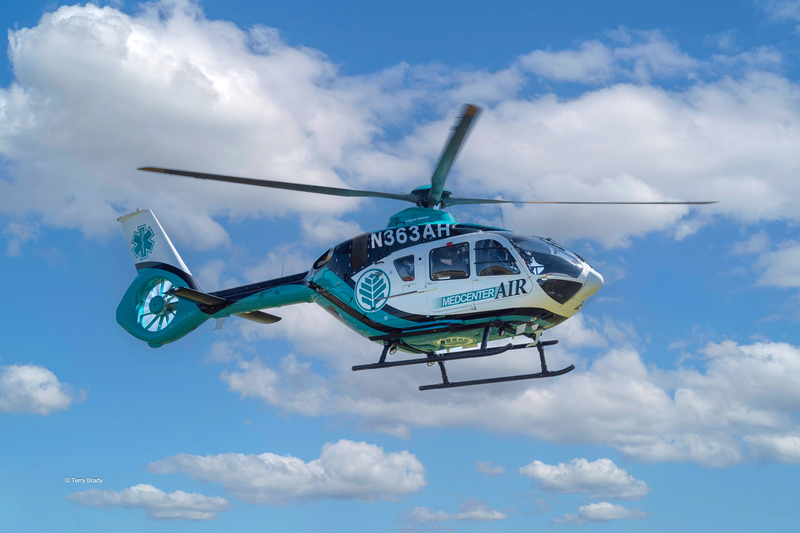 Medical helicopter hovering in the sky