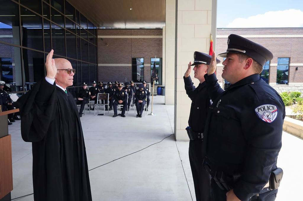 Officer Wesley Arjona and Officer Anthony Becker swearing in.