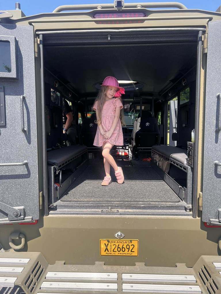 Child in the SWAT truck