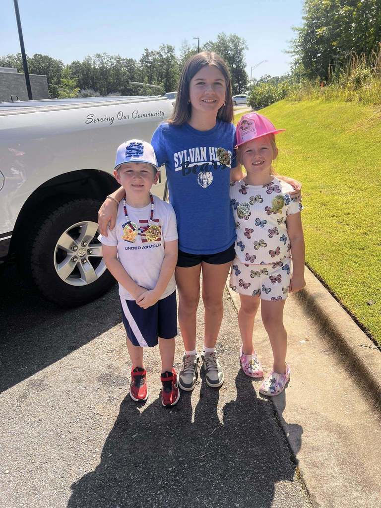 Children with their police badge stickers