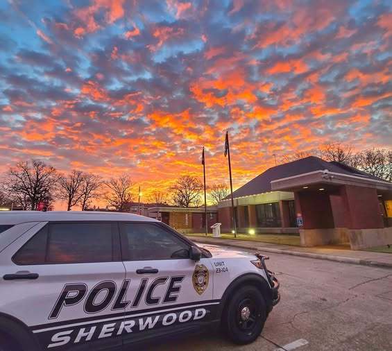 Sherwood Police Car in front of a sunset