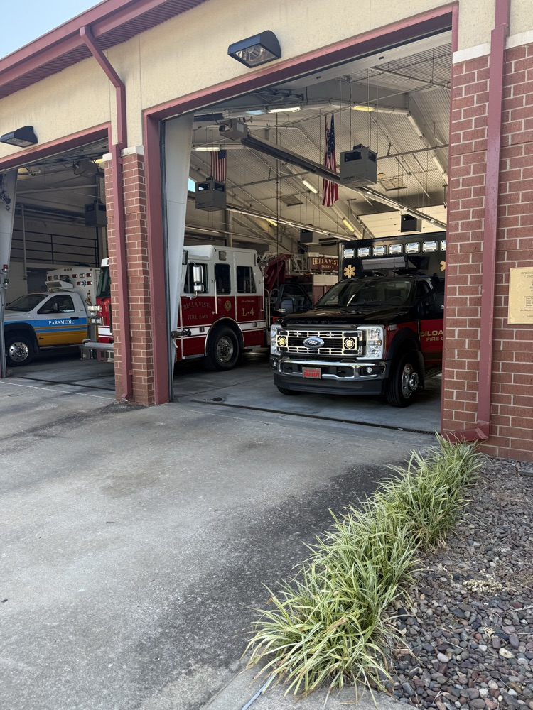Siloam Springs Ambulance and Ladder Truck in Fire Station