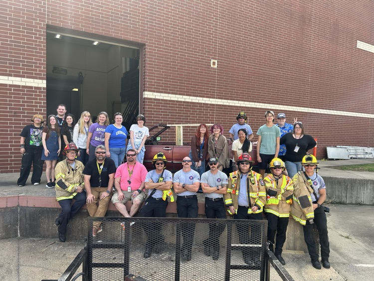 Firefighters with a bunch of kids