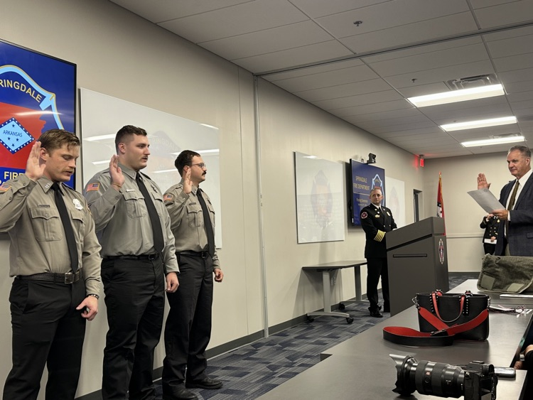 Firefighter being sworn in