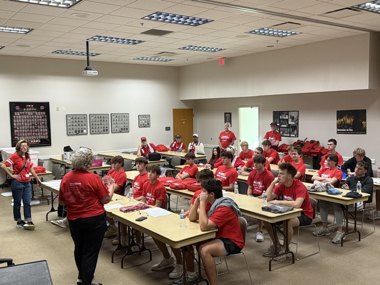Red Cross volunteers having a debriefing