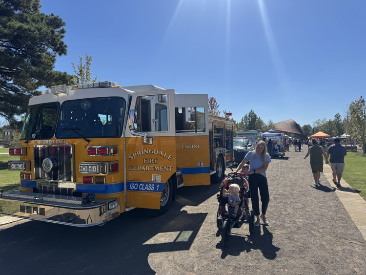 people standing by fire truck