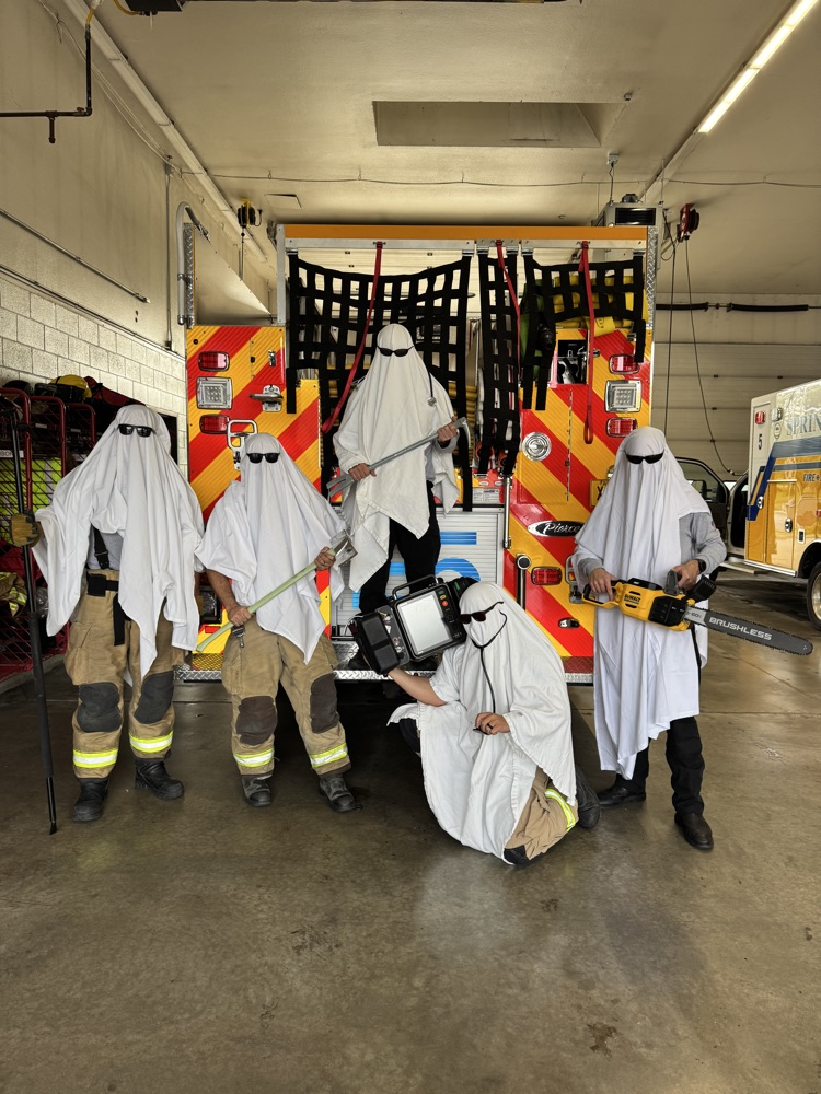 Crews dressed up as ghost for Halloween