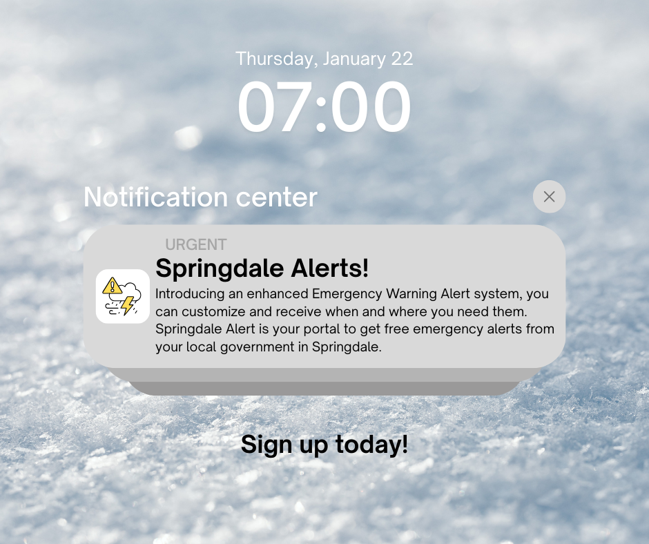 A smartphone-style notification screen showing the time 7:00 a.m. on Thursday, January 22. An urgent alert titled āSpringdale Alerts!ā explains an enhanced emergency warning system that allows residents to customize when and where they receive local emergency alerts from the City of Springdale. The background shows an icy, winter scene, with the text āSign up today!ā at the bottom.