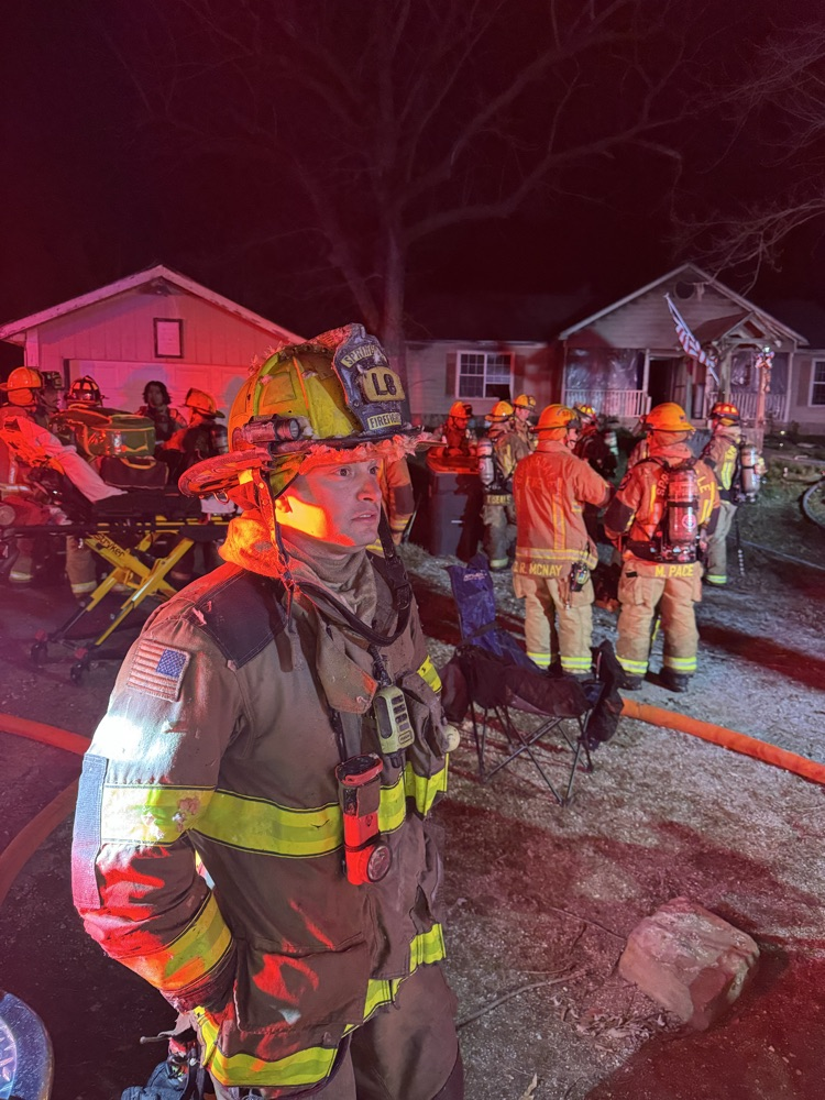 fire fighter on scene of a house fire