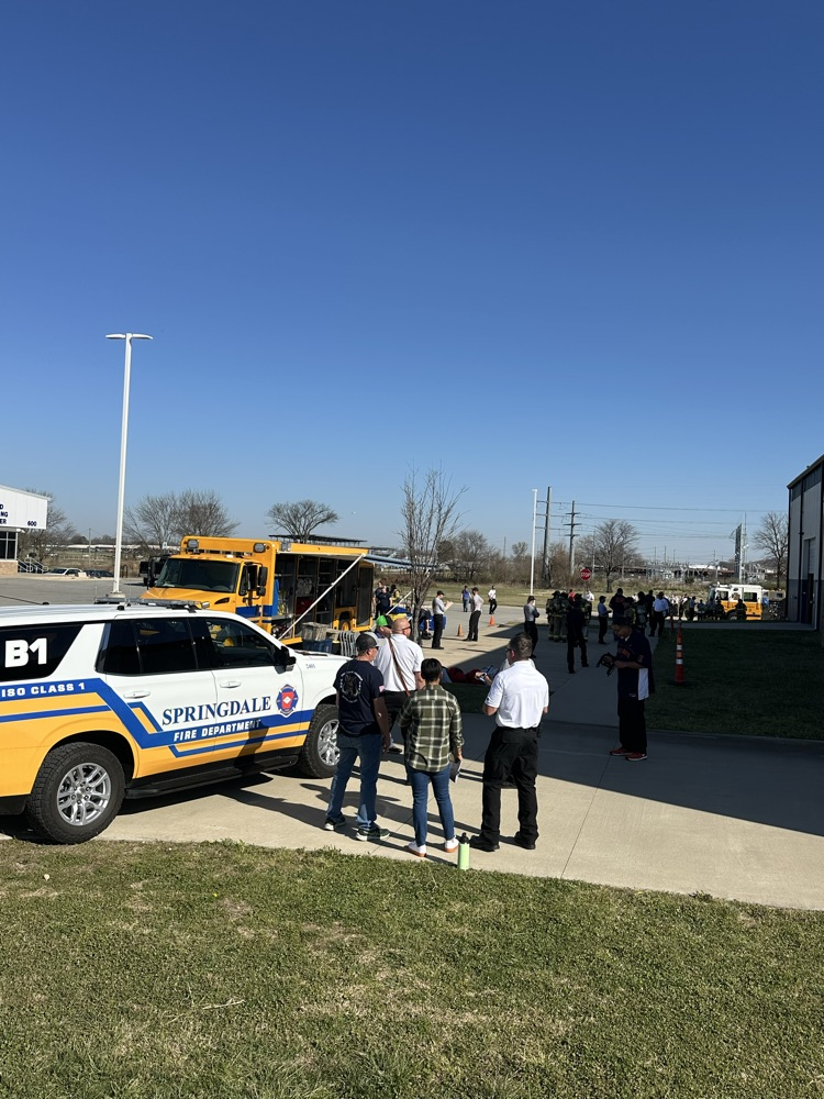 Command vehicle and hazmat truck with fire department personnel