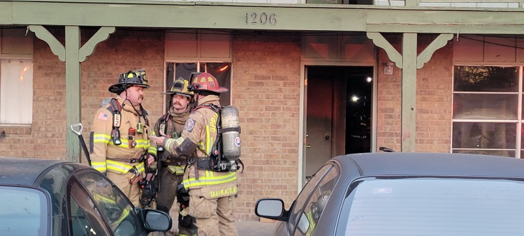 firefighters discussing strategy