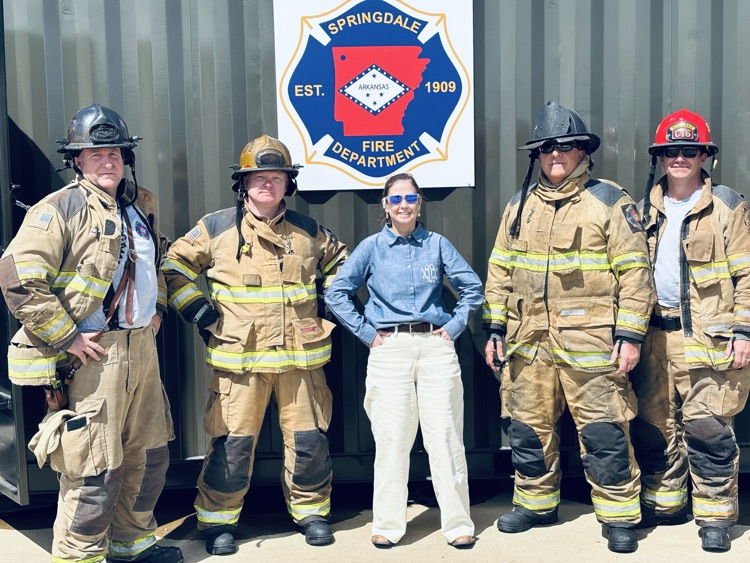 firefighters posing for a photo 