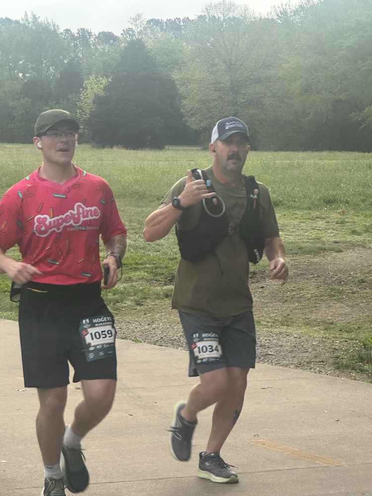 two firefighters running