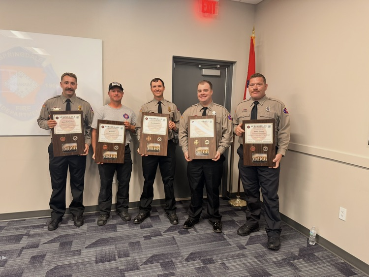 firefighters with the plaques for the Officer Development program