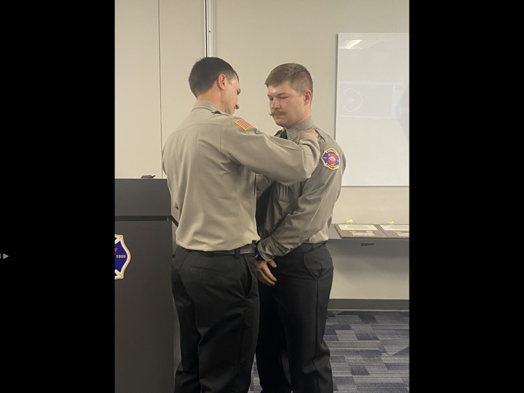 firefighter being pinned by captain