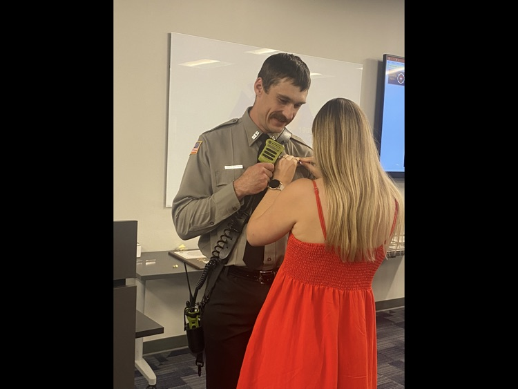 firefighter being pinned by his wife