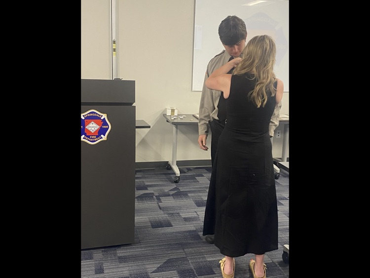 firefighter being pinned by his wife