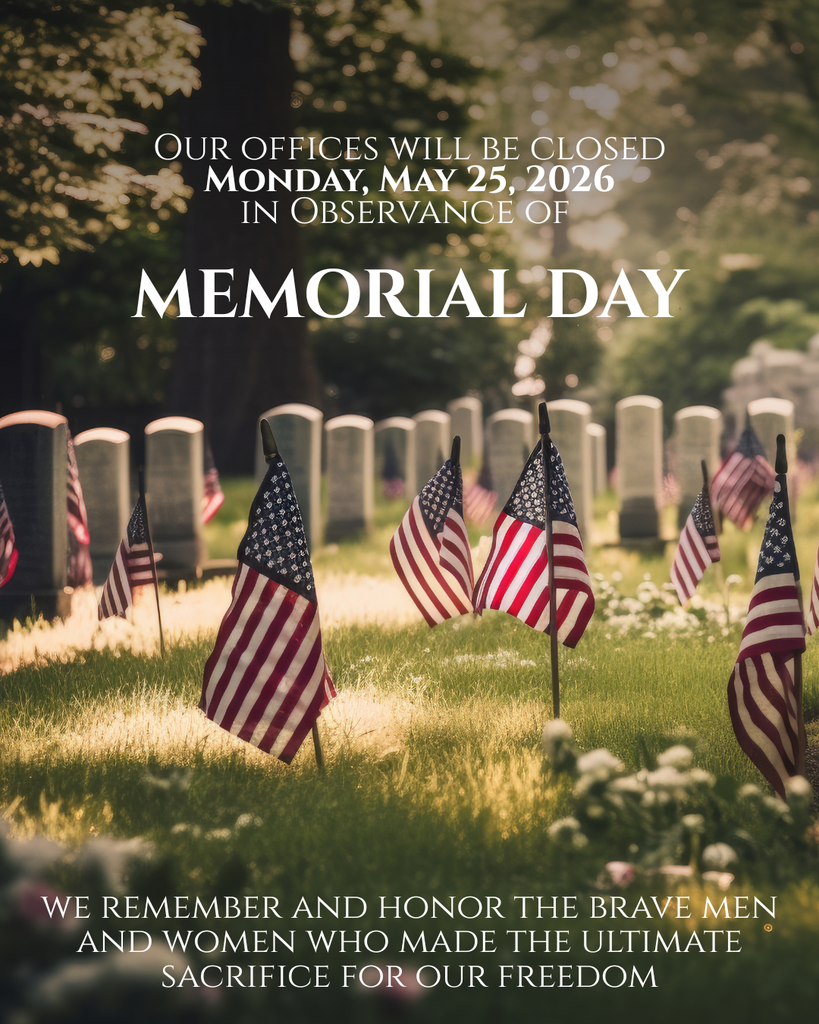 A solemn Memorial Day office closure graphic featuring a peaceful cemetery scene at golden hour. Rows of white headstones stretch softly into the background beneath tall trees, while multiple small American flags are placed throughout the grassy landscape in tribute to fallen service members. Warm sunlight filters through the trees, creating a reflective and respectful atmosphere with soft highlights and blurred background details.  Centered near the top of the image is white serif text that reads: “Our offices will be closed Monday, May 25, 2026 in observance of Memorial Day,” with “Memorial Day” displayed prominently in large capital letters across the middle of the graphic. At the bottom, additional text reads: “We remember and honor the brave men and women who made the ultimate sacrifice for our freedom.” The overall design conveys remembrance, patriotism, and reverence for those who served and sacrificed.