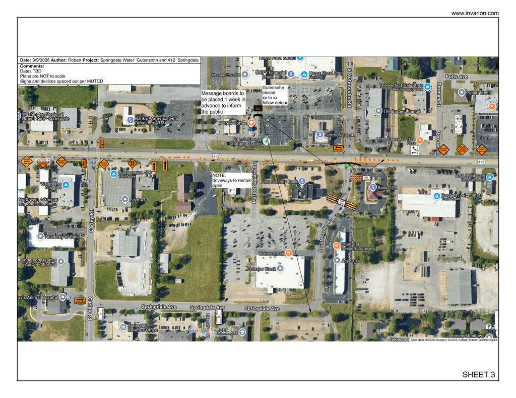 A detailed aerial traffic control plan showing the intersection of West Sunset Avenue (Highway 412) and South Gutensohn Road in Springdale, Arkansas, where sanitary sewer improvements will require temporary traffic modifications. Highway 412 runs east-west across the center of the image, while South Gutensohn Road intersects from the north and continues south through a commercial area. Orange traffic-control symbols identify construction warning signs, lane-shift markers, barricades, and directional arrows placed throughout the work zone.  The plan indicates that South Gutensohn Road will be closed at the Highway 412 intersection and that motorists will be directed to use alternate routes. Orange dotted lines illustrate the temporary traffic pattern along Highway 412. Multiple callout notes explain that electronic message boards will be installed one week before construction to notify drivers of upcoming closures and detours. Another note states that access to adjacent business driveways will remain open during construction.  Several surrounding businesses are visible and labeled, including Walgreens, Feed 479, First Security Bank, Simmons Bank, Little Caesars Pizza, Doggett Freightliner, and Bank OZK. Barricades are shown near the entrance drives serving First Security Bank and nearby commercial properties, indicating restricted access within portions of the work area. The traffic control plan emphasizes maintaining traffic movement on Highway 412 while safely directing vehicles around the construction zone and preserving access to local businesses wherever possible.