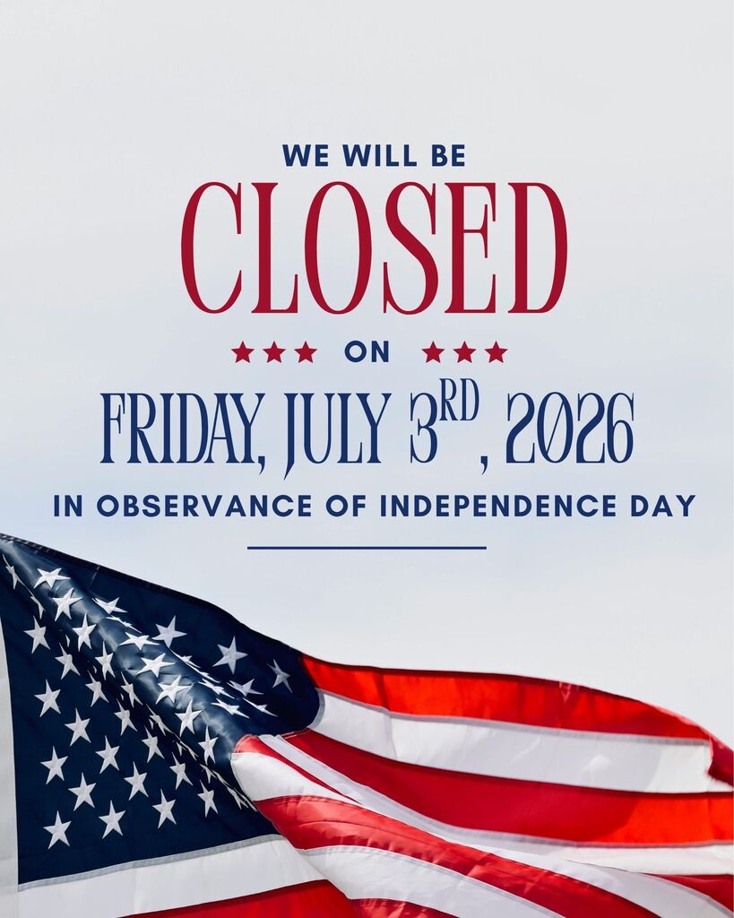 A patriotic holiday closure graphic on a clean white background announces a City office closure for Independence Day. Centered at the top, bold blue uppercase text reads, “WE WILL BE.” Directly beneath it, the word “CLOSED” appears in very large, elegant red serif lettering, making it the focal point of the design. Below, a row of three red stars appears on each side of the word “ON,” which is written in bold blue uppercase letters. The date is displayed in large decorative blue serif text reading, “FRIDAY, JULY 3RD, 2026,” with the “RD” appearing slightly raised in a smaller font size. Beneath the date, bold blue uppercase text states, “IN OBSERVANCE OF INDEPENDENCE DAY.” A thin horizontal blue line sits below the text, separating the announcement from the image at the bottom.  The lower third of the graphic features a close-up photograph of a waving American flag stretching across the width of the image. The flag's blue canton with white stars is visible on the left, while vivid red and white stripes flow across the remainder of the bottom edge. The fabric appears gently rippled, creating a sense of movement and adding texture to the otherwise minimal design. The overall color palette is red, white, and blue, reinforcing the patriotic theme while maintaining a clean, professional appearance.  Text on graphic: "We will be CLOSED on Friday, July 3rd, 2026, in observance of Independence Day."