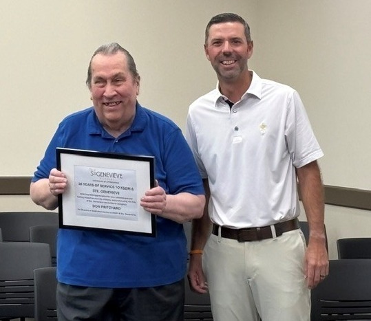 Don Pritchard standing next the Mayor