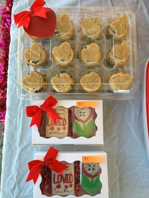 boxes of baked goods with ribbons
