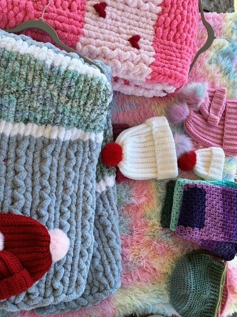 handmade crochet blue blanket, pink blanket, hats of multicolors, white,green and purple