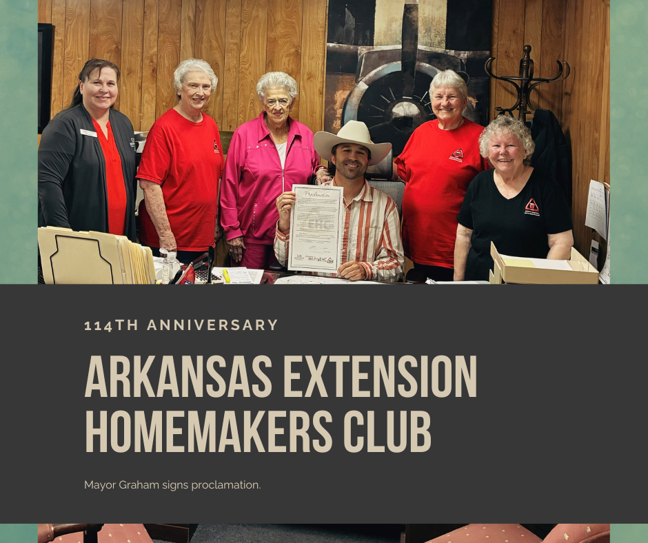 green background group picture of mayor signing proclamation for the arkansas extension homemakers club 114th anniversary