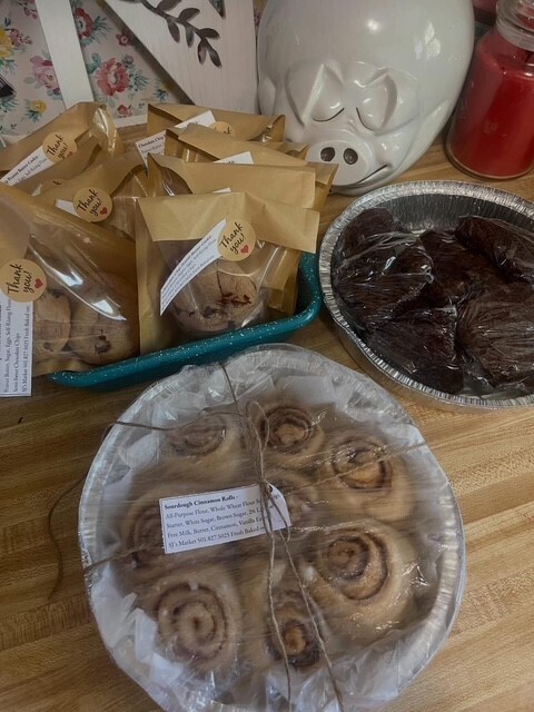 Photo of cinnamon rolls, cookies, brownies