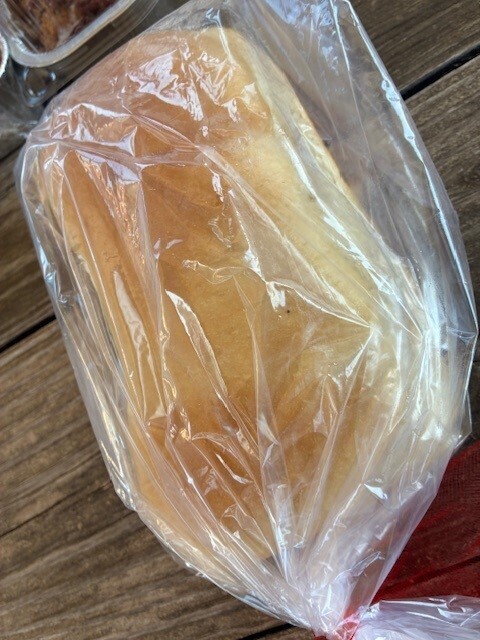 homemad e bread in plastic wrap