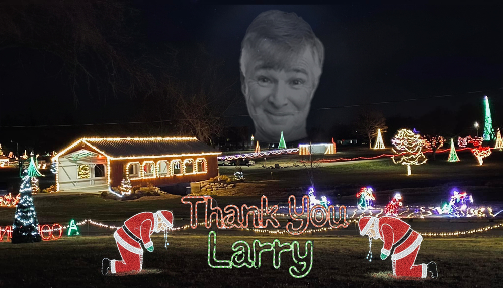 Lights at Harter Park with Larry Ampspaugh faded in the background