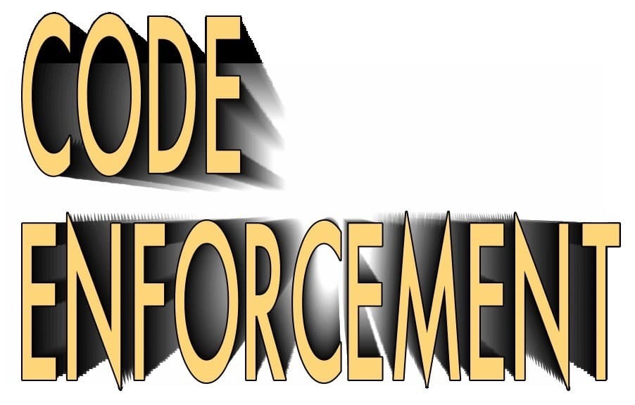 light yellow CODE ENFORCEMENT in all CAPS with a gray shadow