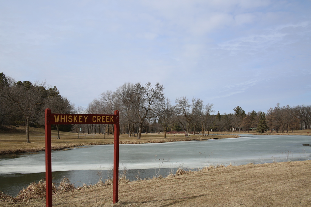 Whiskey Creek Sign and Creek